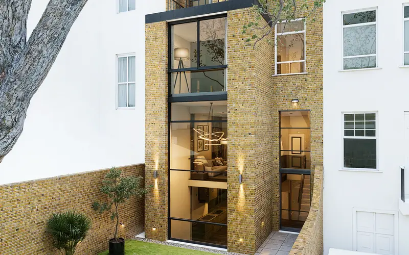 Nine flats back into one family house